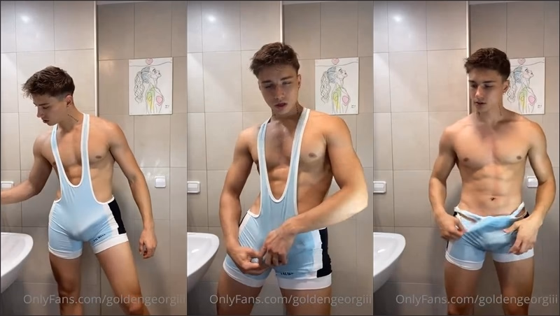 JustTheGays thumbnail for goldengeorgiii shows off his cock in a wrestling singlet - amateur gay porn from OnlyFans JustForFans GayForFans - 