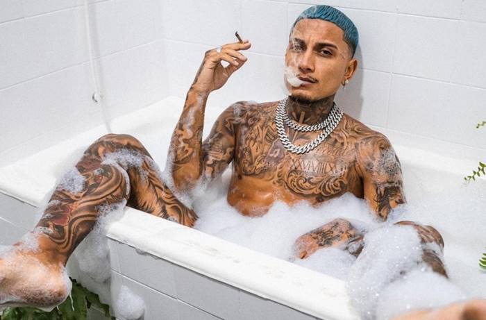 JustTheGays thumbnail for Dynho Alves (Dynhoalves) – clip of him rolling a blunt with his cock out - amateur gay porn from OnlyFans, MyVidster, GayForFans and more! - Solo